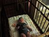 Baby Child Sleeping in a Crib (Haiku)