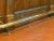 THE BRASS RAIL
